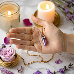 Pendant with amethyst in pouch + chain