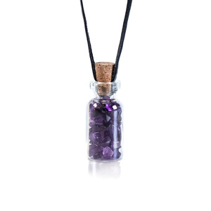 Amethyst – Steine in einer kleinen Flasche
